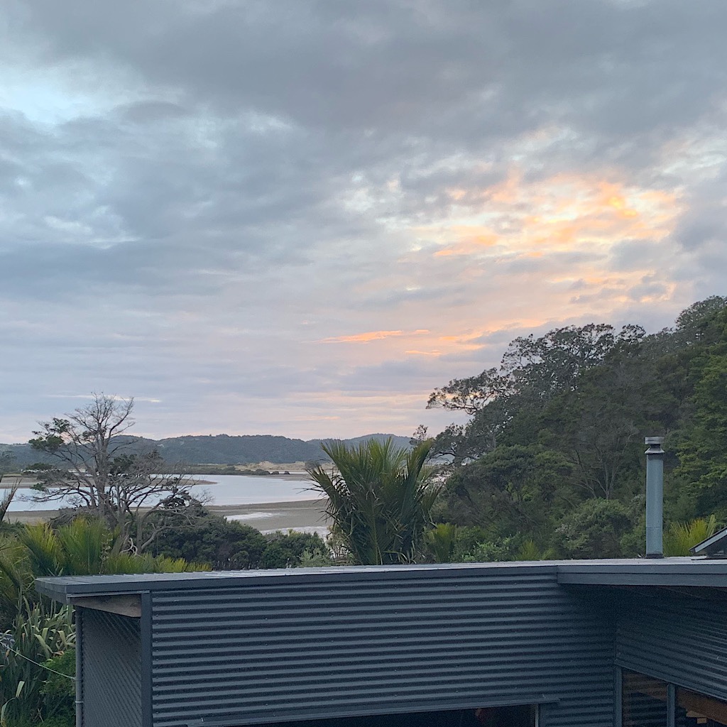 The view from my single room out above James private residence towards Nikau Bay. 
