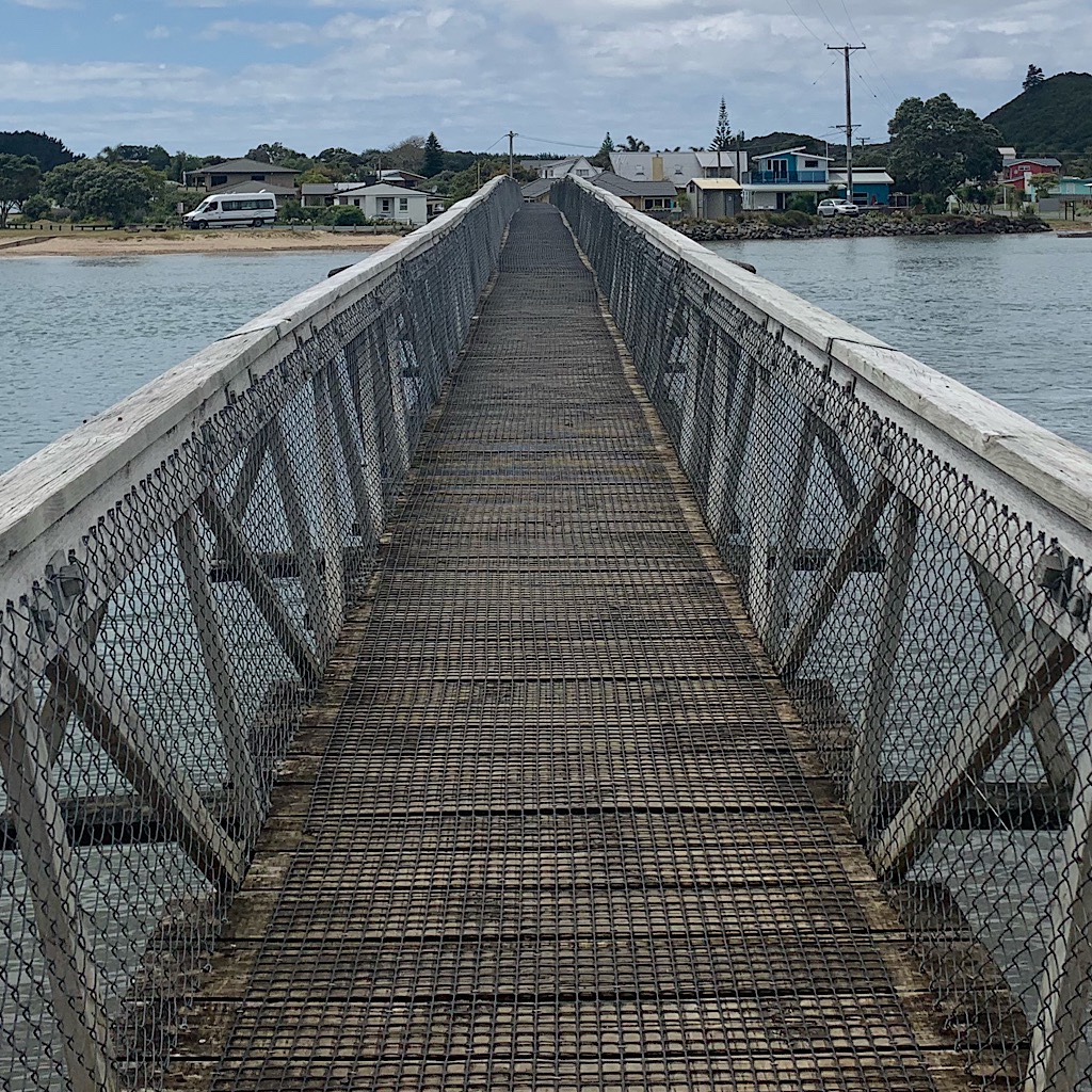 The footbridge to the Pataua North settlement.