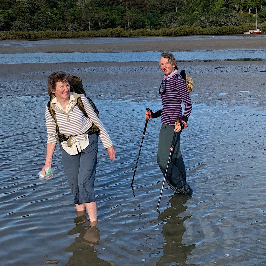 Ros hiked the Te Araroa last year at the age of 66. This morning, she carries Olive Oyl across the Taiharuru Estuary.