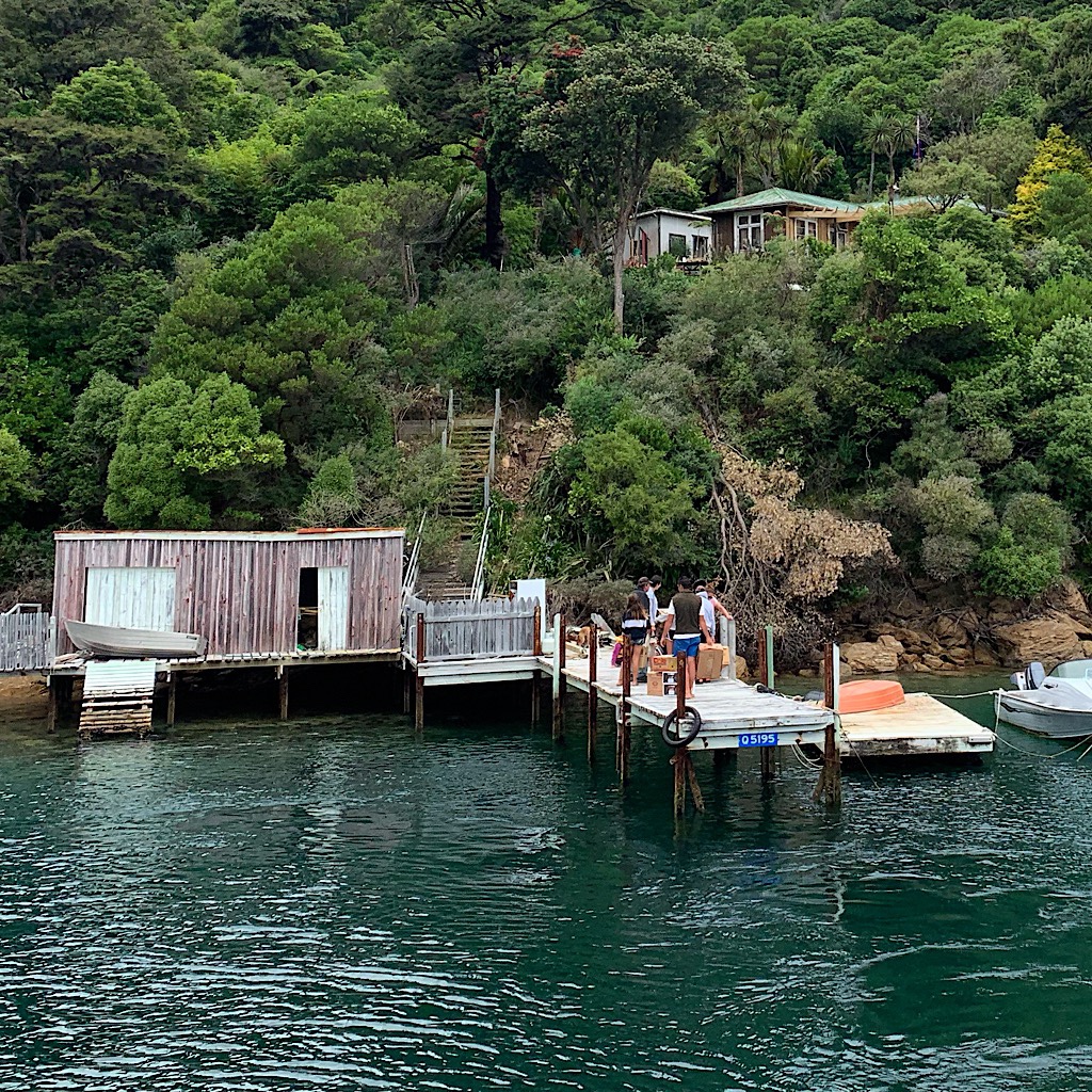 Delivering mail and goods to one of the many secluded houses in the Sound. The captain shared the cost of nearly every property as we passed through. 