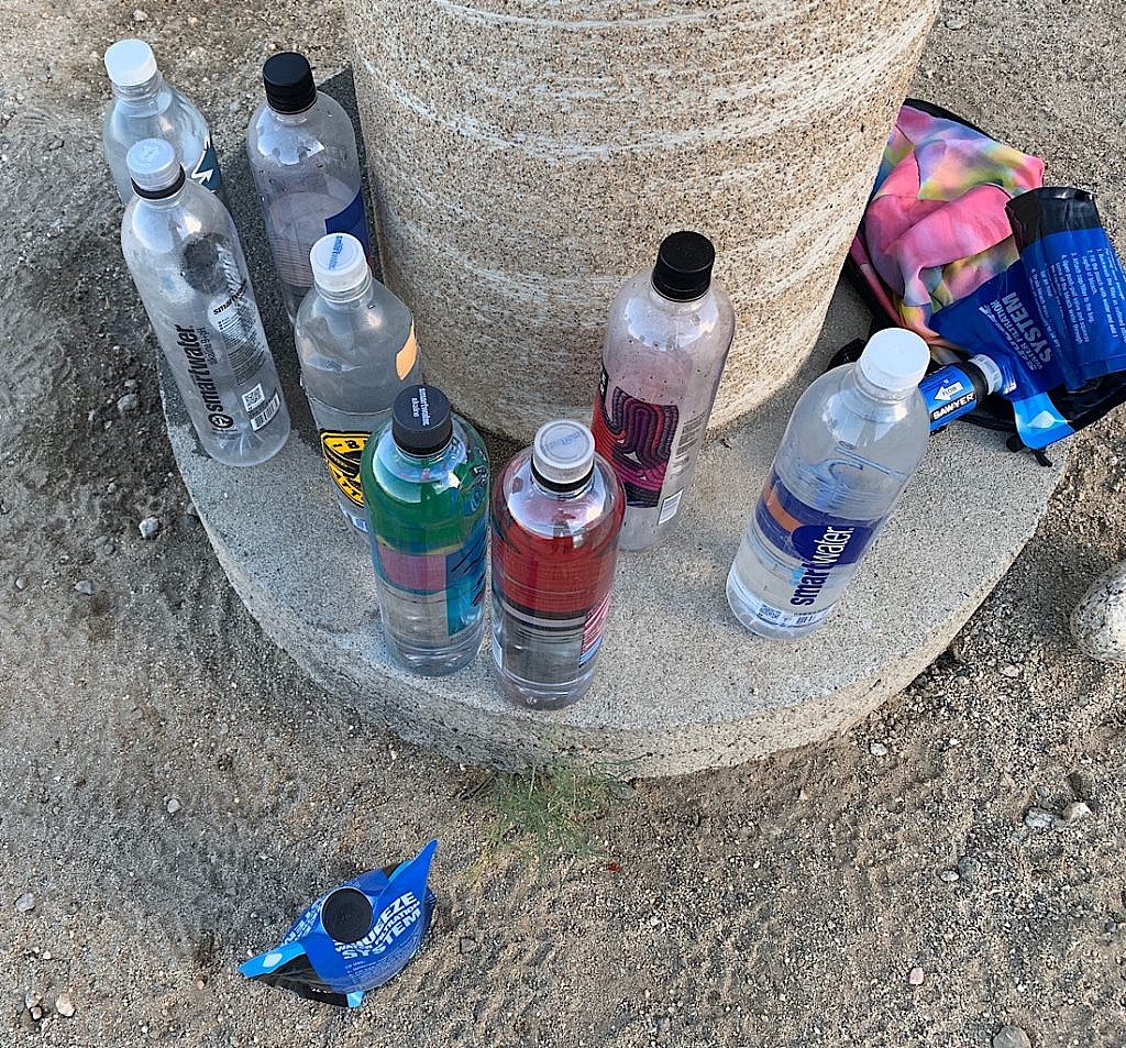 Filling bottles before a twenty mile waterless ascent of San Jacinto peak. 