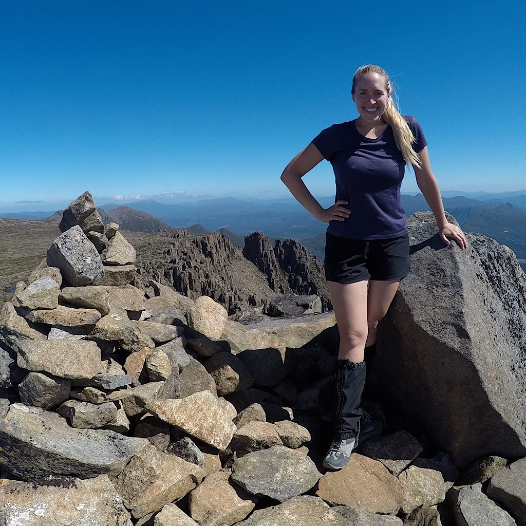 Emily Granger atop a summit in Tasmania.