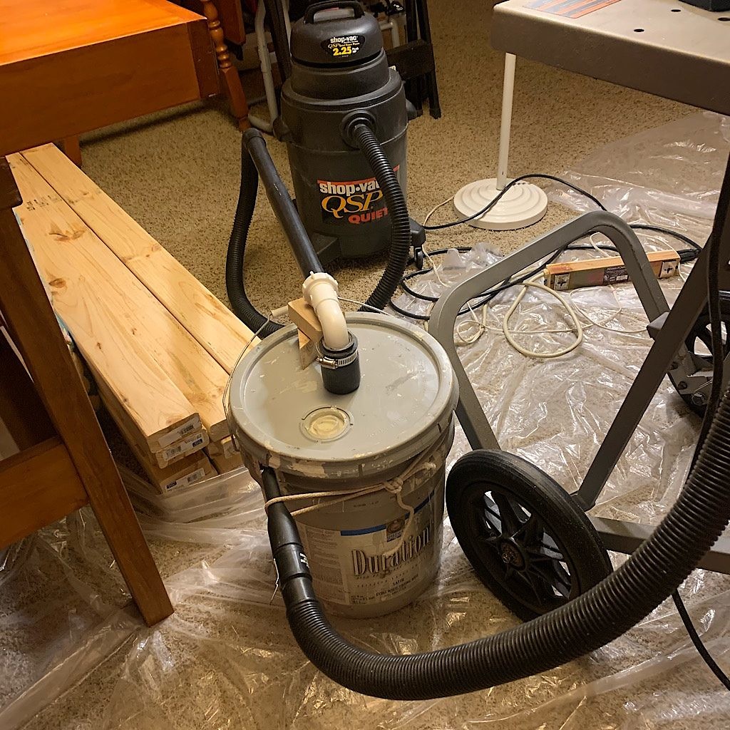 A special contraption to catch sawdust before it enters the vacuum cleaner. 