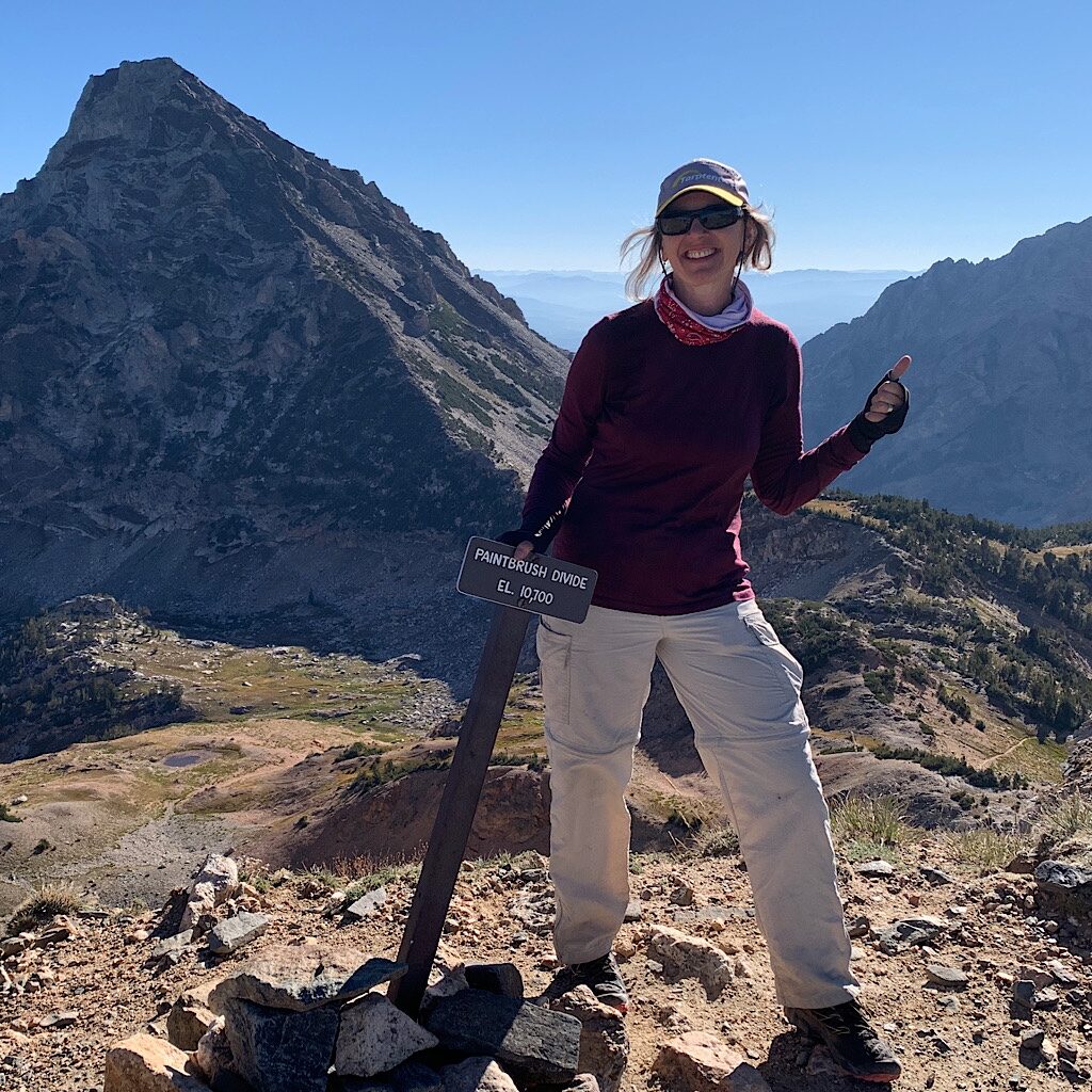 Feeling strong with Grizzly Lake just below and the Wind River Range in the distance. 
