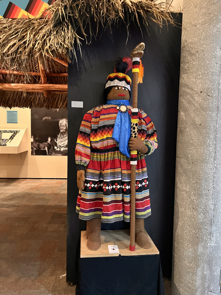 A giant doll in the Ah-Tah-Thi-Ki Museum made by Seminoles out of saw palmetto and cloth. They sold these to the tourists as well as wrestled alligators to make money and stay on their land. Nowadays, they own casinos. 