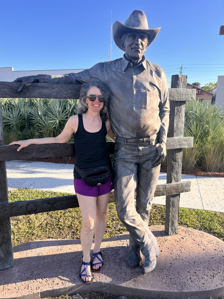 Showered and wearing clean-ish clothes at the Cattle Drive Sculpture in Okeechobee.